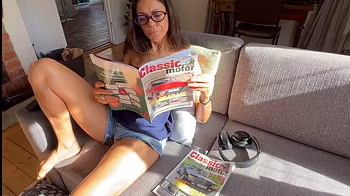 I was chillin’ reading my cars’ magazine when my hubby decided to fuck my pussy with my big dildo